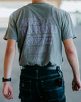 Christian streetwear "Be Truth & Light" t-shirt worn by male model displaying back graphic Transformed Romans 12:2 design.