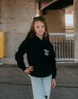 Unisex children’s hoodie featuring Child of God lettering, comfy plush fabric, perfect for school, church, or casual wear.