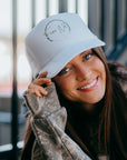 Model wearing Fear Not hat styled for everyday wear, declaring faith and courage in Christ.